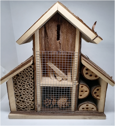 wooden insect hotel with bark