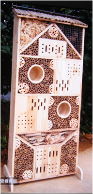 giant insect hotel with stand.