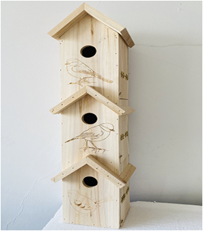 big wooden bird house with laser carving birds